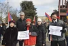 Diversi sostenitori di CSI fra cui Felix Kuhn (con la giacca rossa), membro del Consiglio di fondazione, sulla Place des Nations a Ginevra. csi